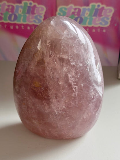 Rainbow filled purple-toned star rose quartz freeform