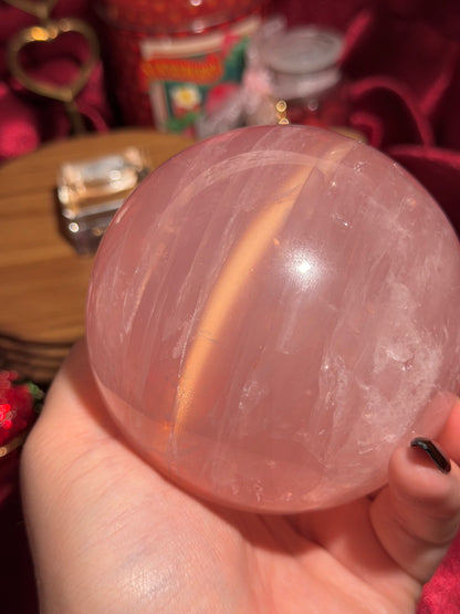 High quality star rose quartz sphere with golden glittery flash