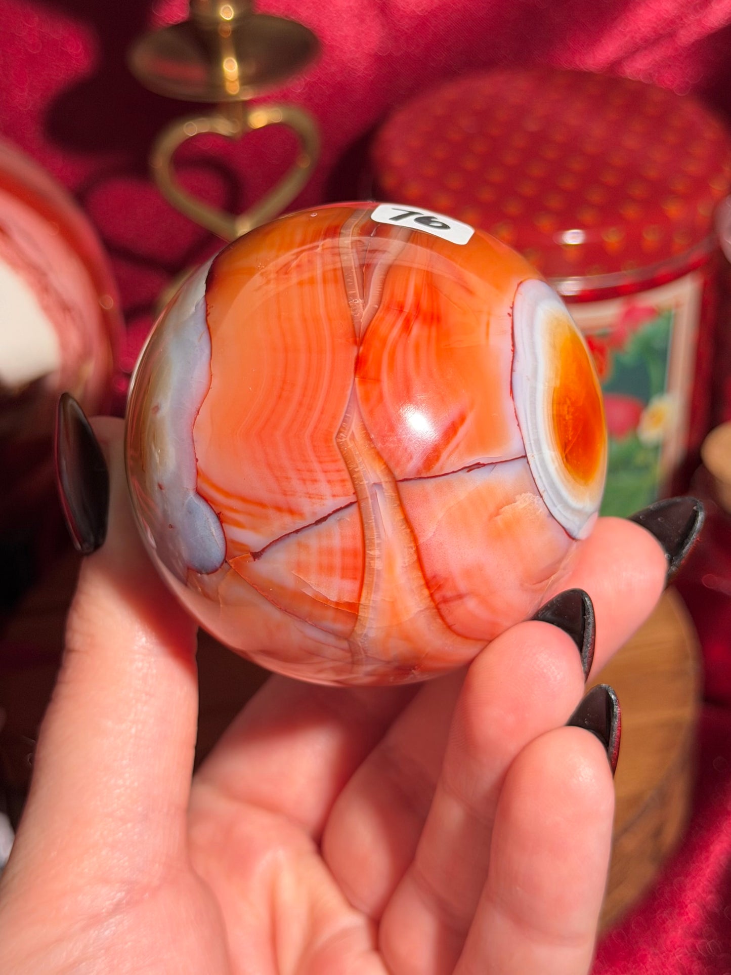 Rainbow banded carnelian sphere 65mm
