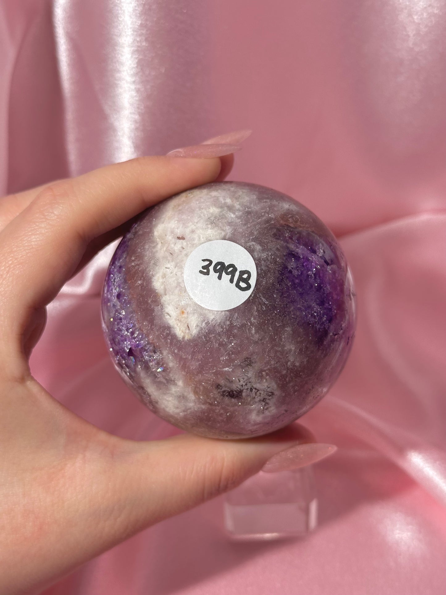 Grape jelly purple Brazilian pink amethyst sphere with unique quartz caves