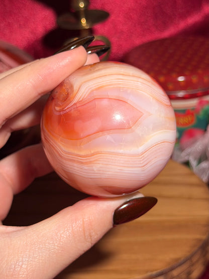Pastel pink carnelian sphere