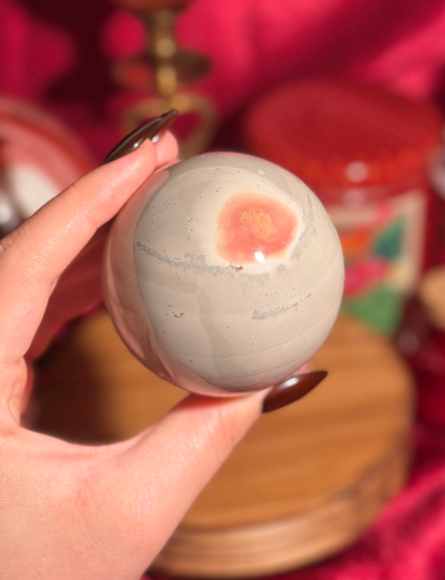 Cool grey polychrome jasper sphere with a pop of pink