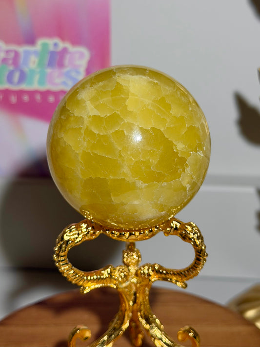 Lemon calcite sphere from Pakistan with rainbows