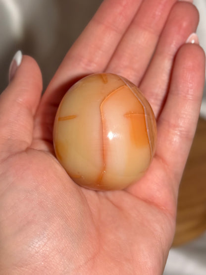 Creamy yellow carnelian palmstone
