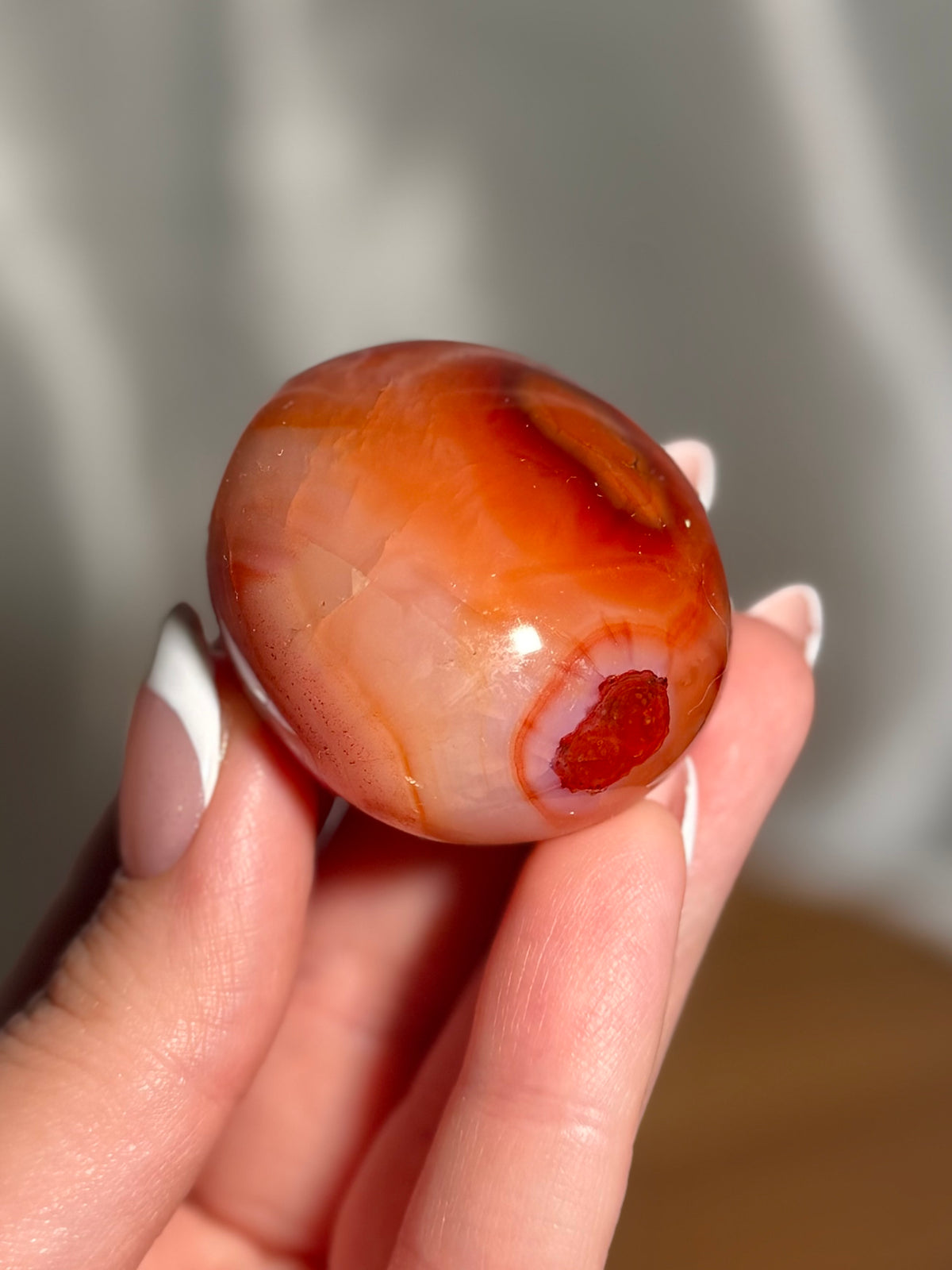 Pink banded carnelian palmstone