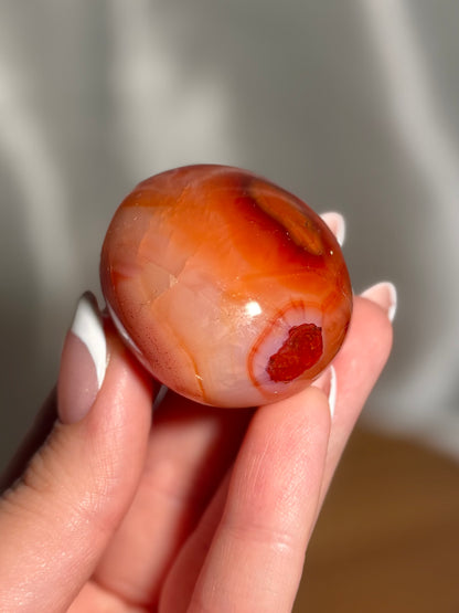 Pink banded carnelian palmstone