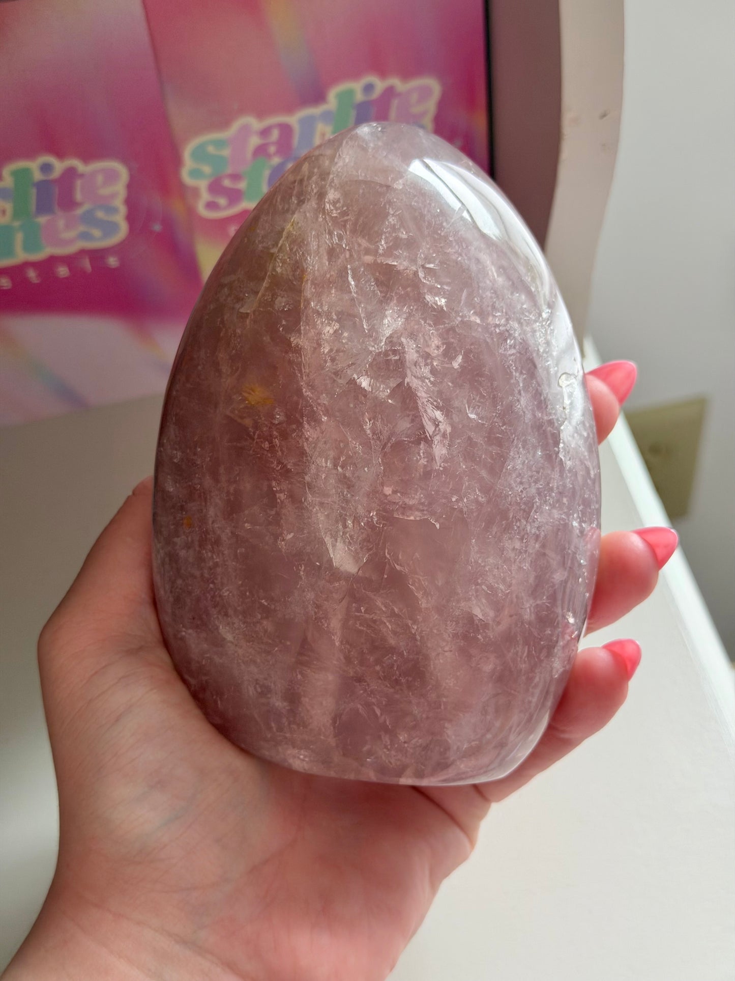 Rainbow filled purple-toned star rose quartz freeform