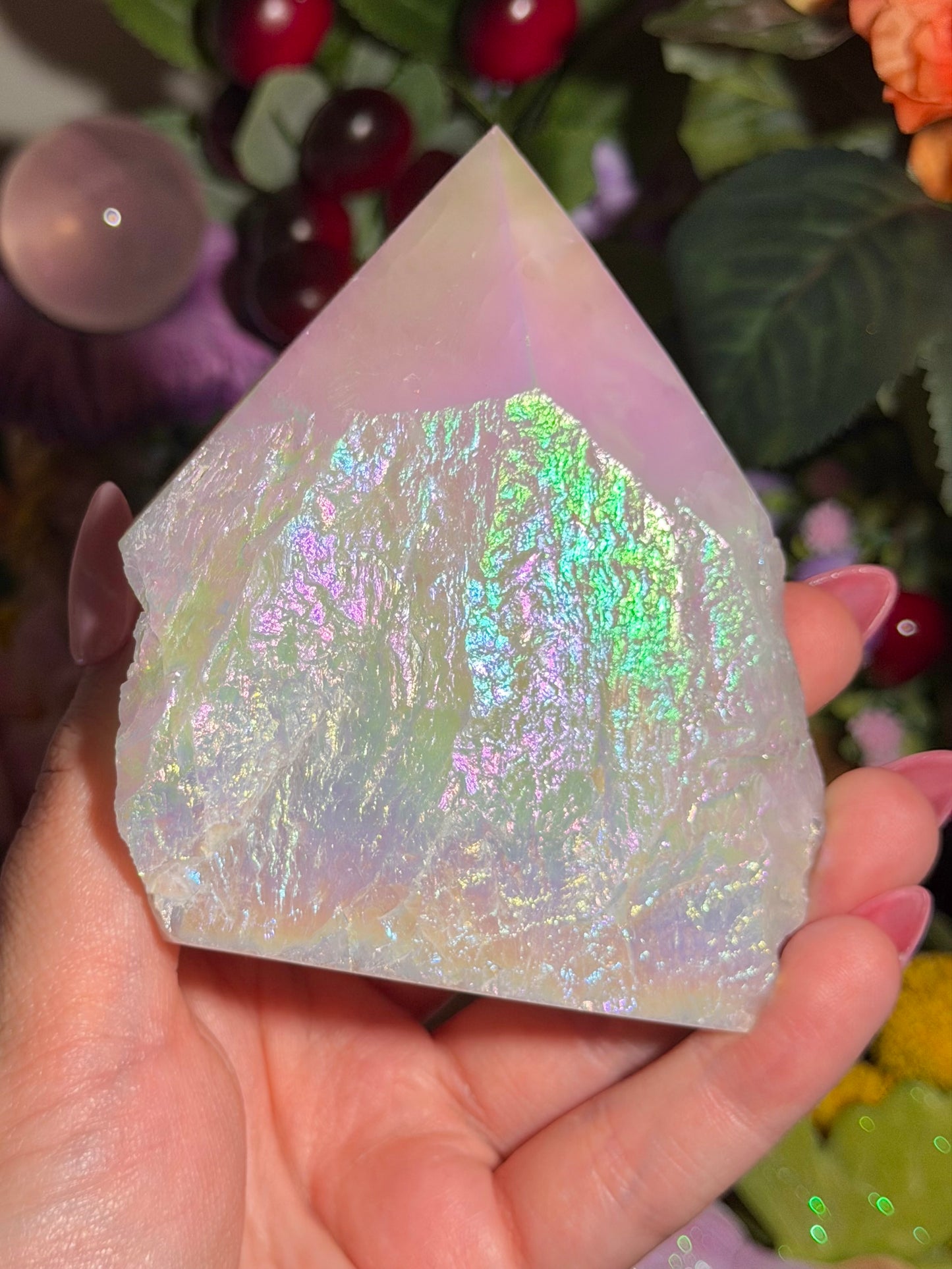 Aura coated rose quartz half polished point from Brazil