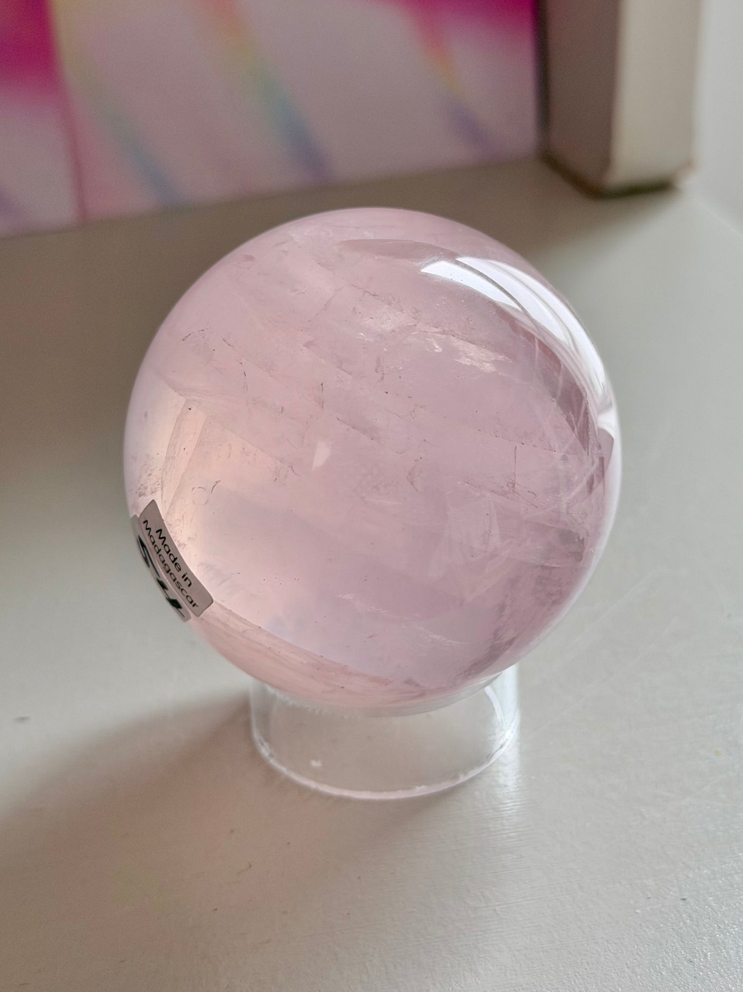Pale pink gemmy star rose quartz sphere