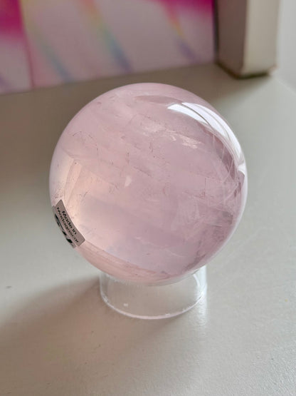 Pale pink gemmy star rose quartz sphere