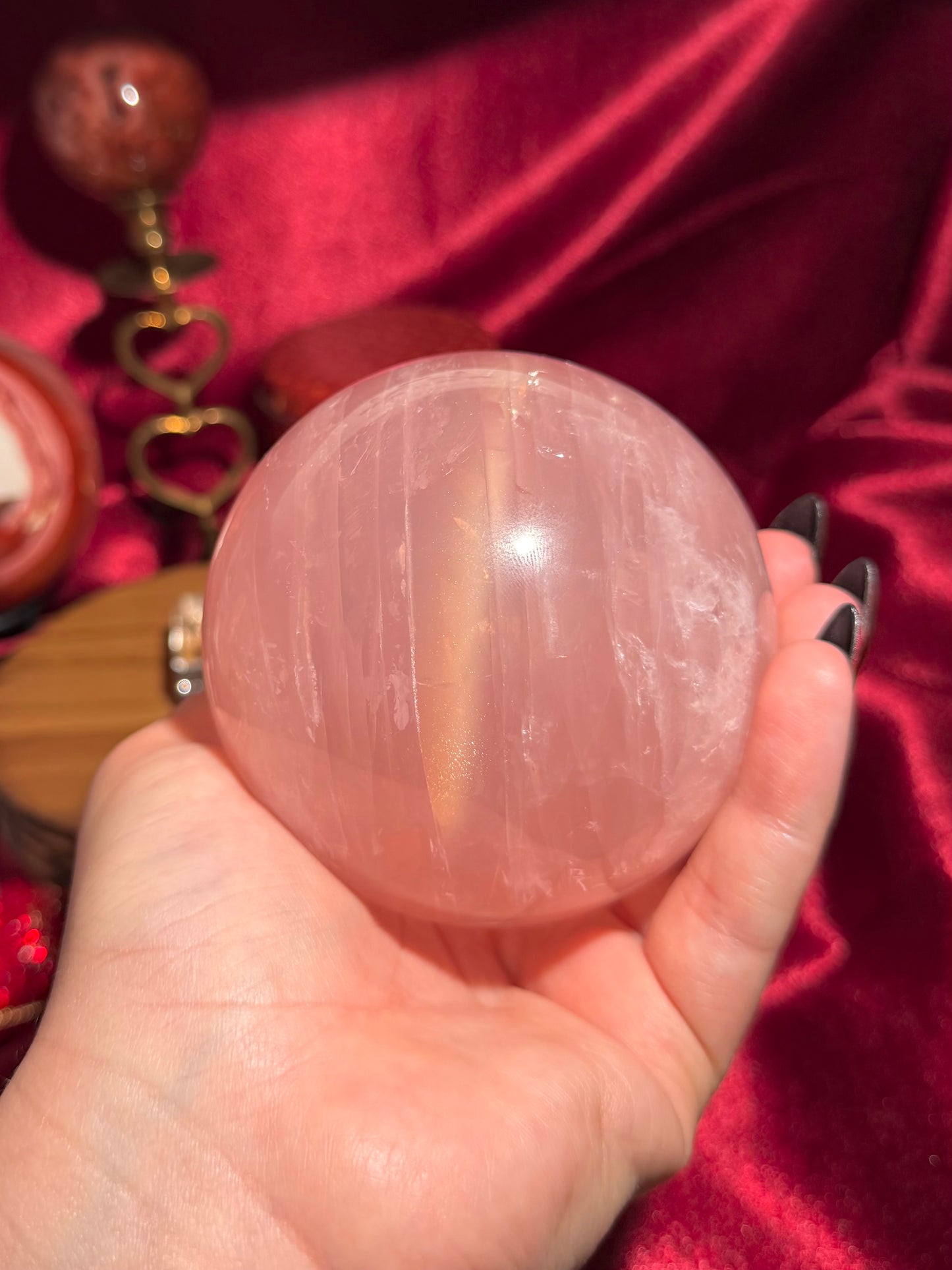 High quality star rose quartz sphere with golden glittery flash