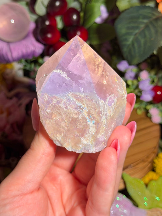Aura coated rose quartz half polished point from Brazil