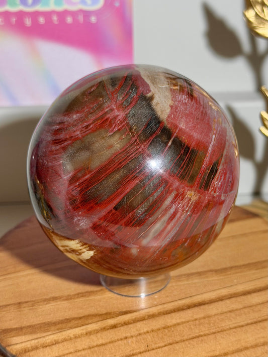 Vampy red and black petrified wood sphere from Madagascar (75E)