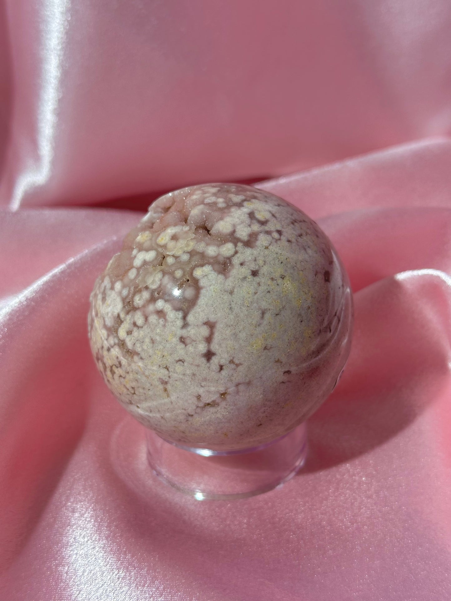 Pink pastel flower agate sphere from Madagascar with bubby druzy