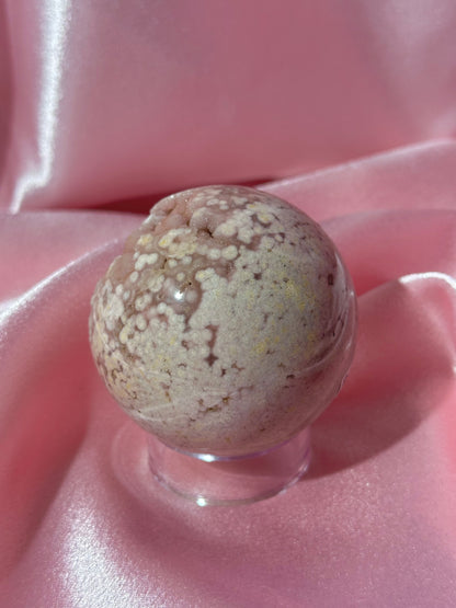 Pink pastel flower agate sphere from Madagascar with bubby druzy
