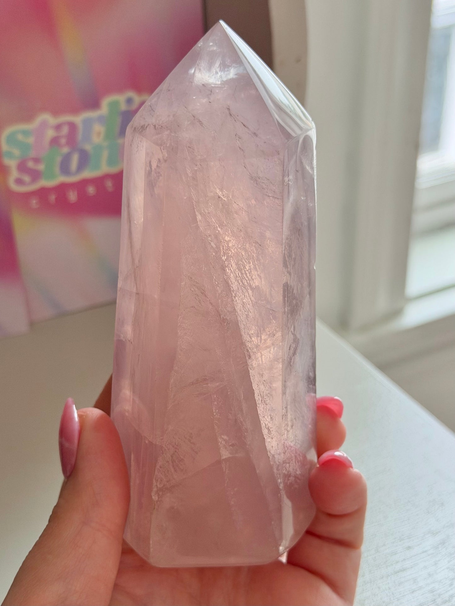 Glassy pink rose quartz tower