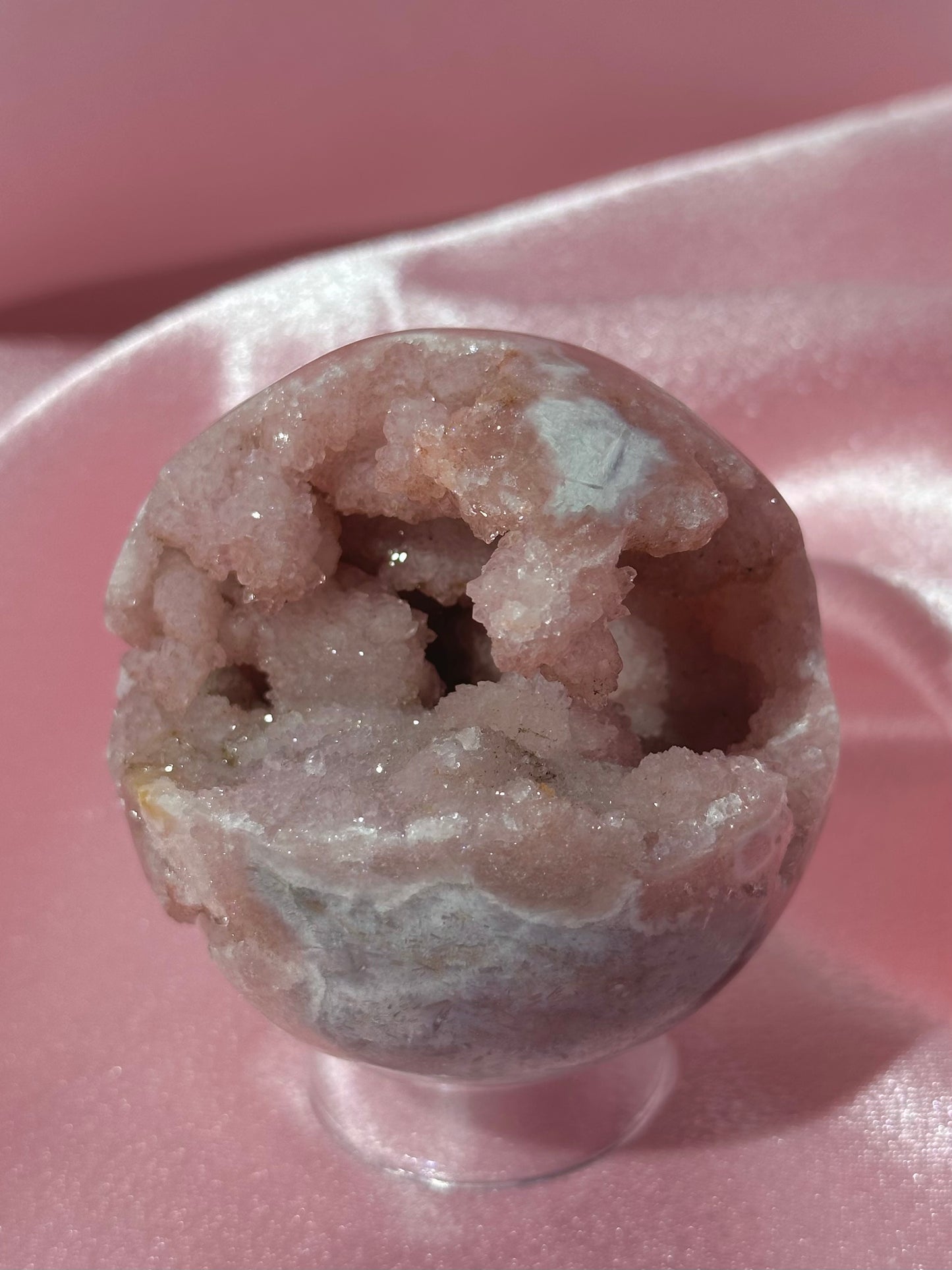 Brazilian pink amethyst sphere with unique bubbly druzy cave