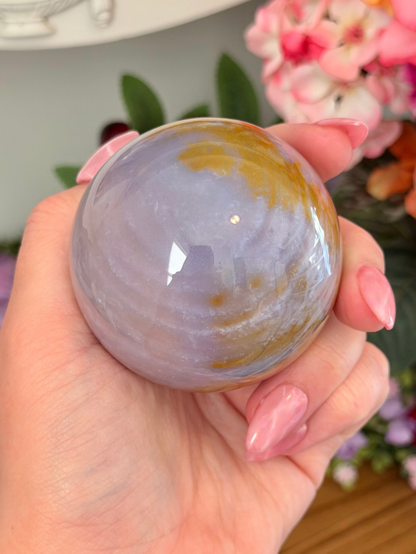 Glowy purple sea jasper sphere