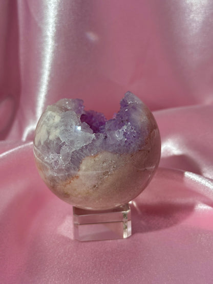 Brazilian pink amethyst sphere with purple druzy cave