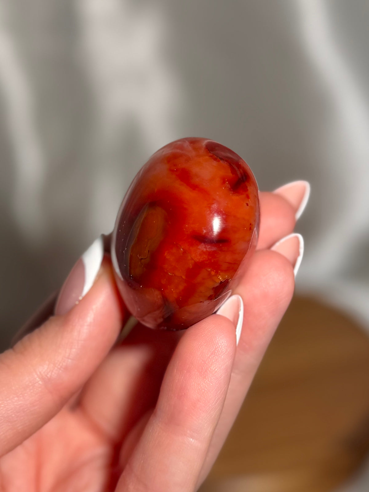 Pink banded carnelian palmstone