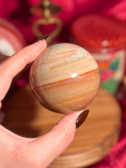 Warm toned polychrome jasper sphere