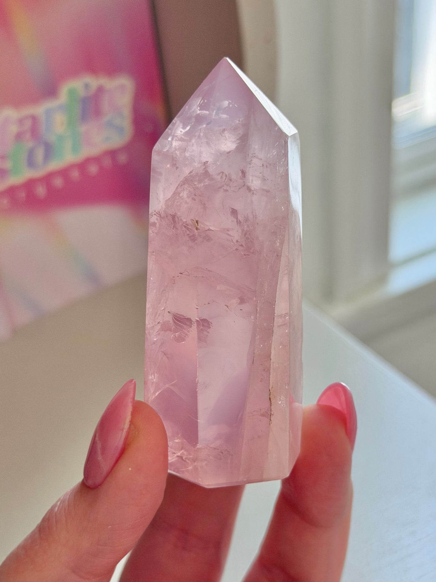 Gemmy purple-toned rose quartz tower