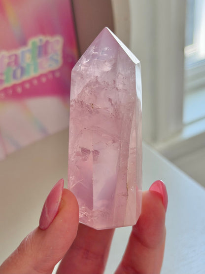 Gemmy purple-toned rose quartz tower