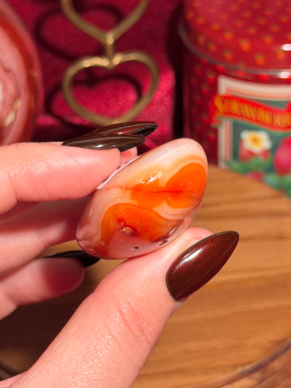 Creamsicle funky banded carnelian palmstone 11A