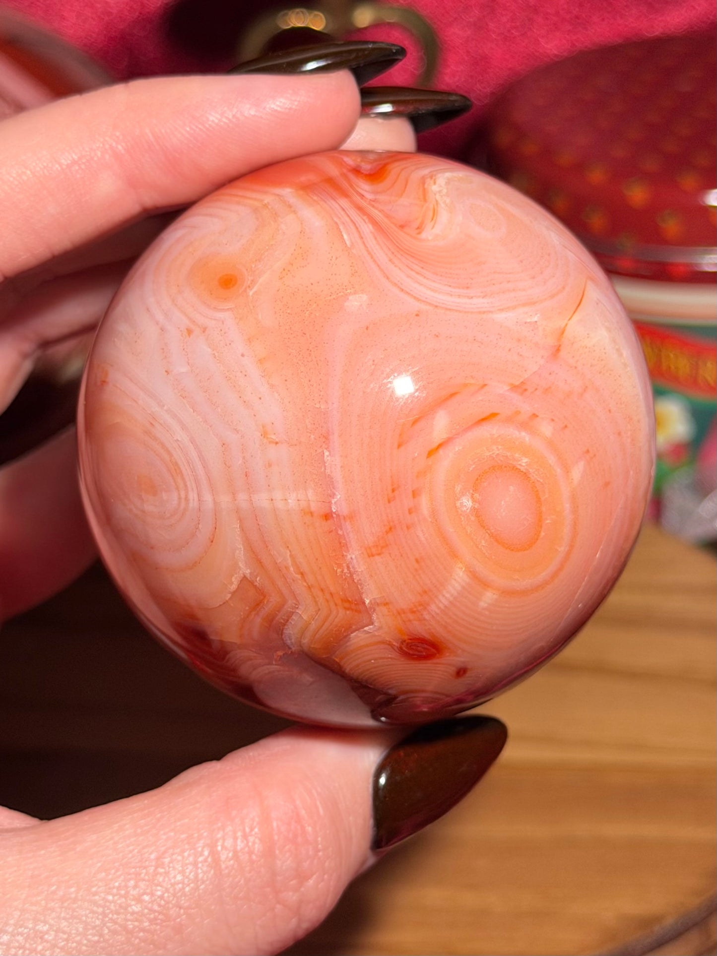 Pink banded carnelian sphere