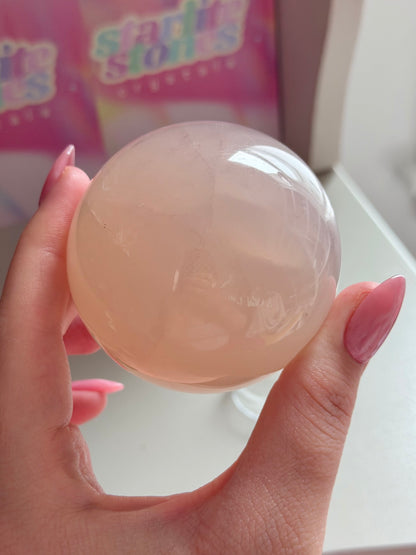 Peach 12-ray star rose quartz sphere