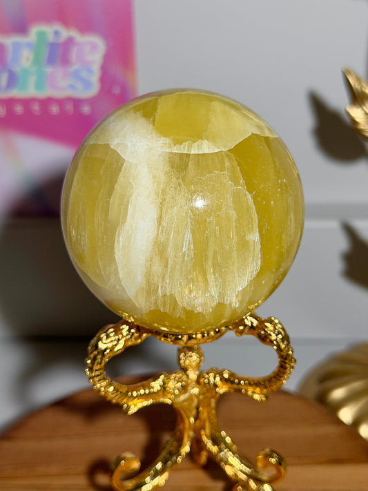 Lemon calcite sphere from Pakistan with rainbows