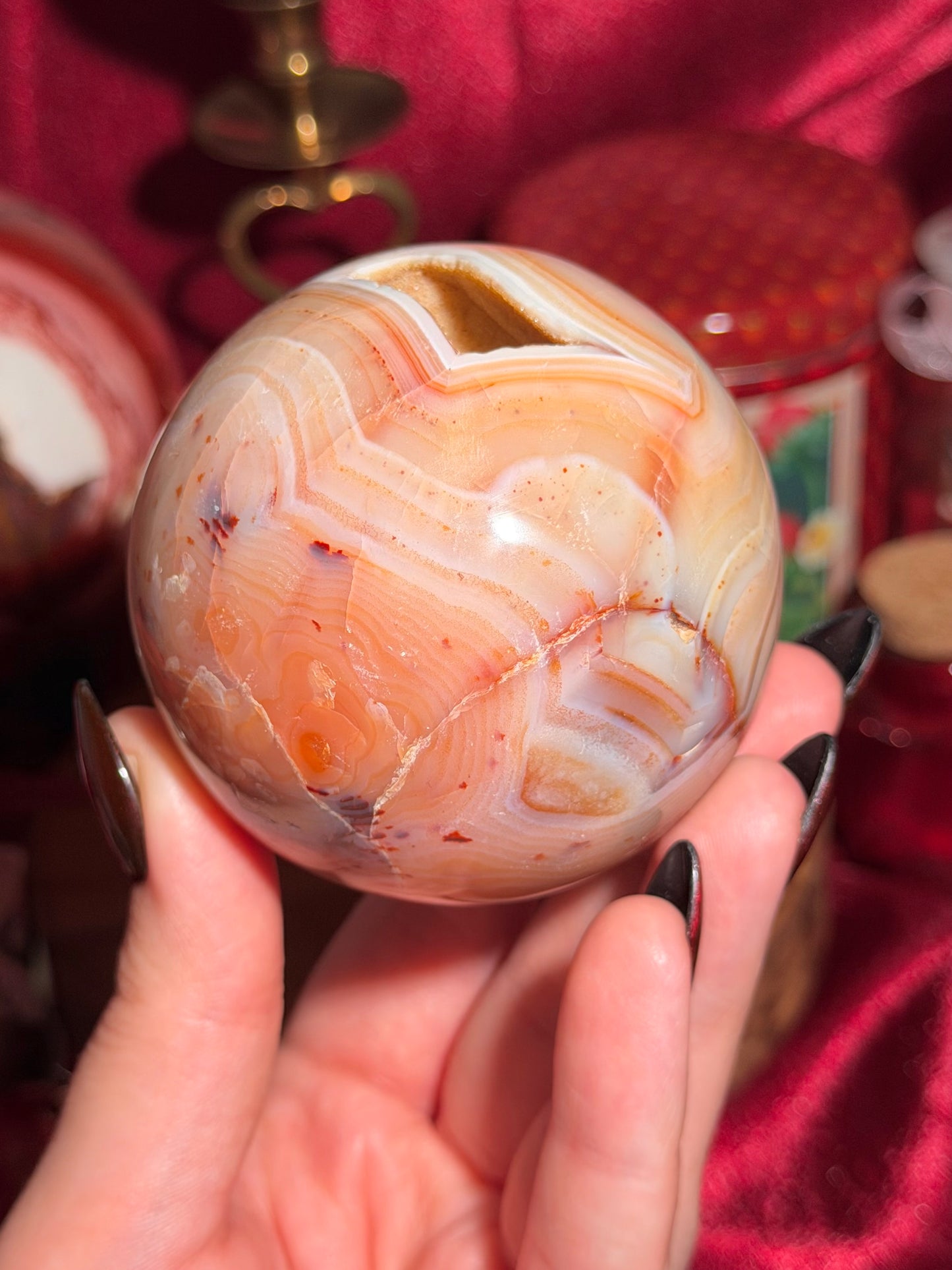 Pastel yellow and peachy toned carnelian sphere with large druzy cave 72mm