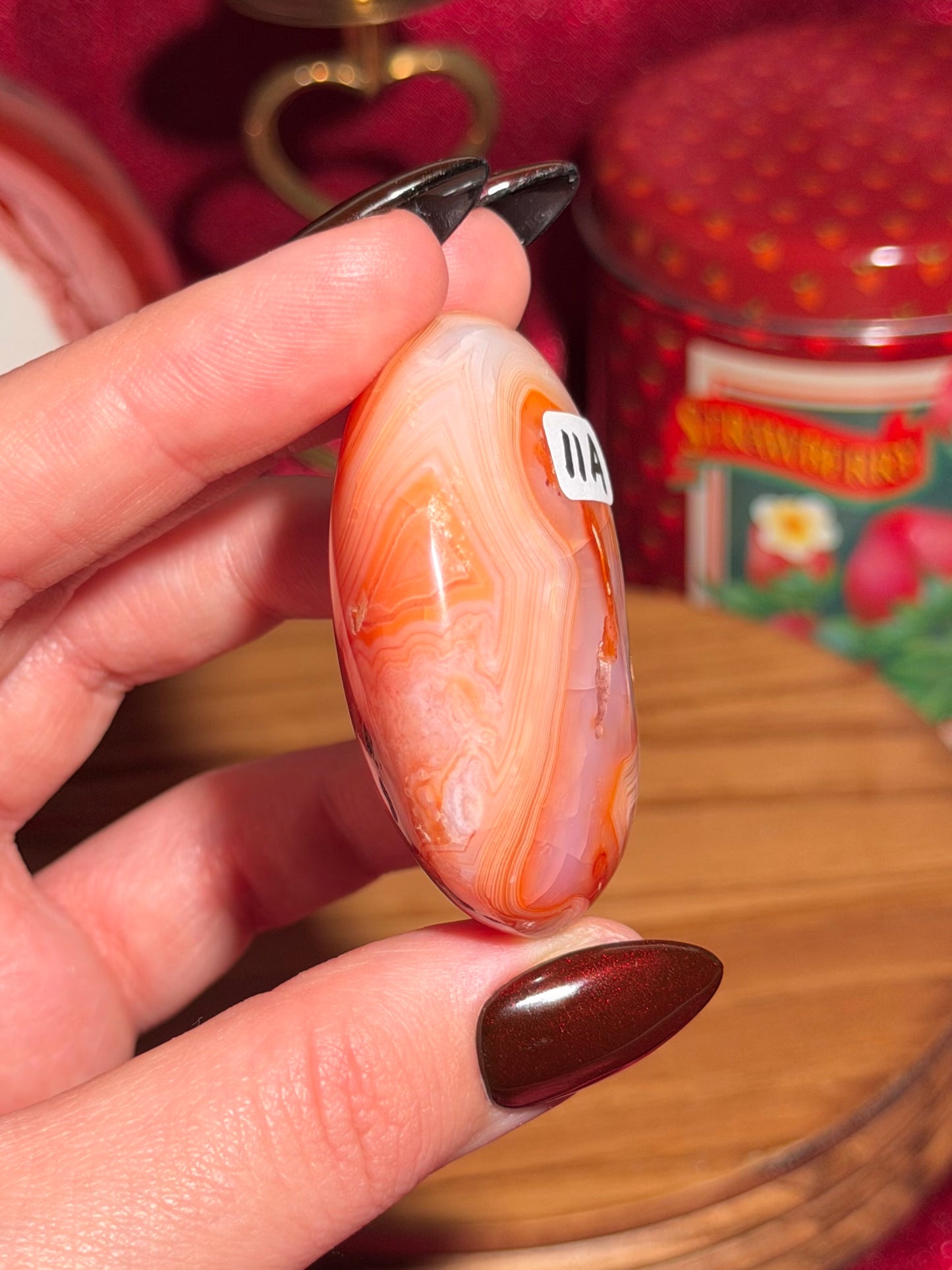 Creamsicle funky banded carnelian palmstone 11A