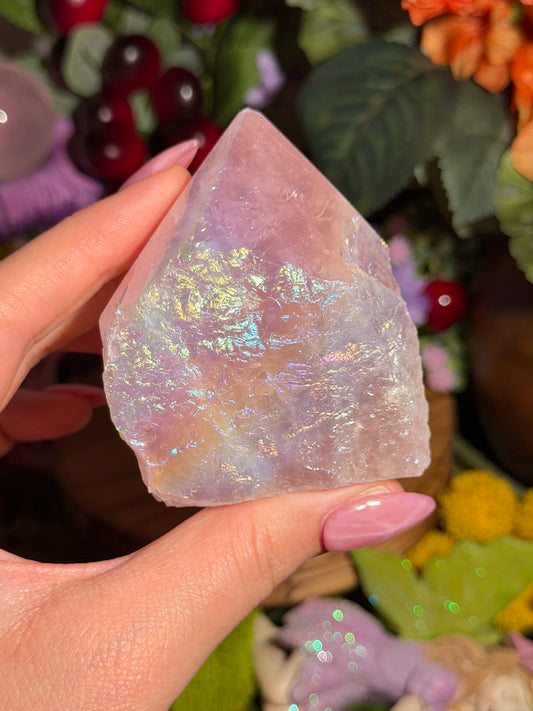 Aura coated rose quartz half polished point from Brazil