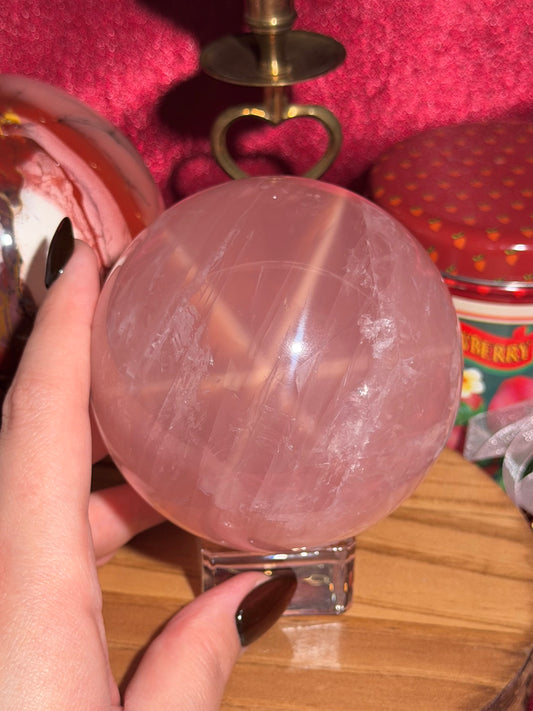 High quality star rose quartz sphere with golden glittery flash