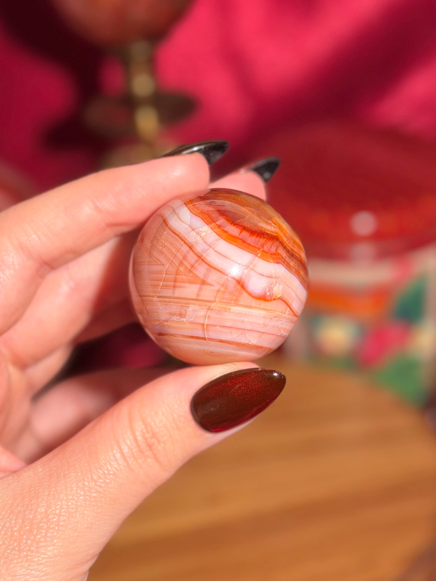 Peachy pink carnelian sphere
