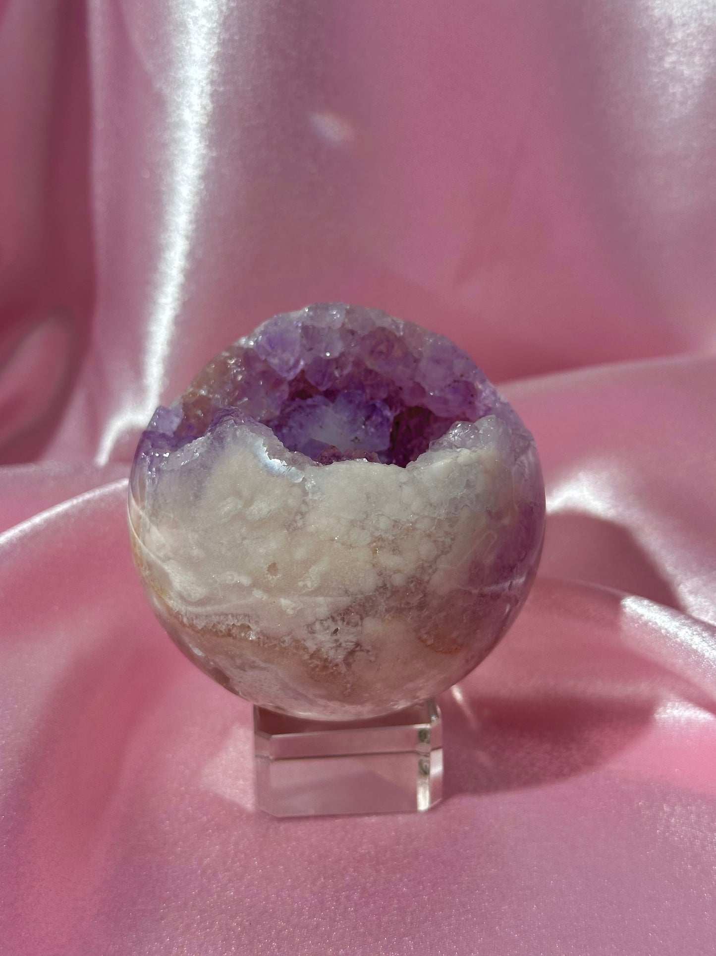 Brazilian pink amethyst sphere with purple druzy cave