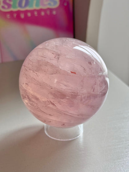 Pink gemmy star rose quartz sphere