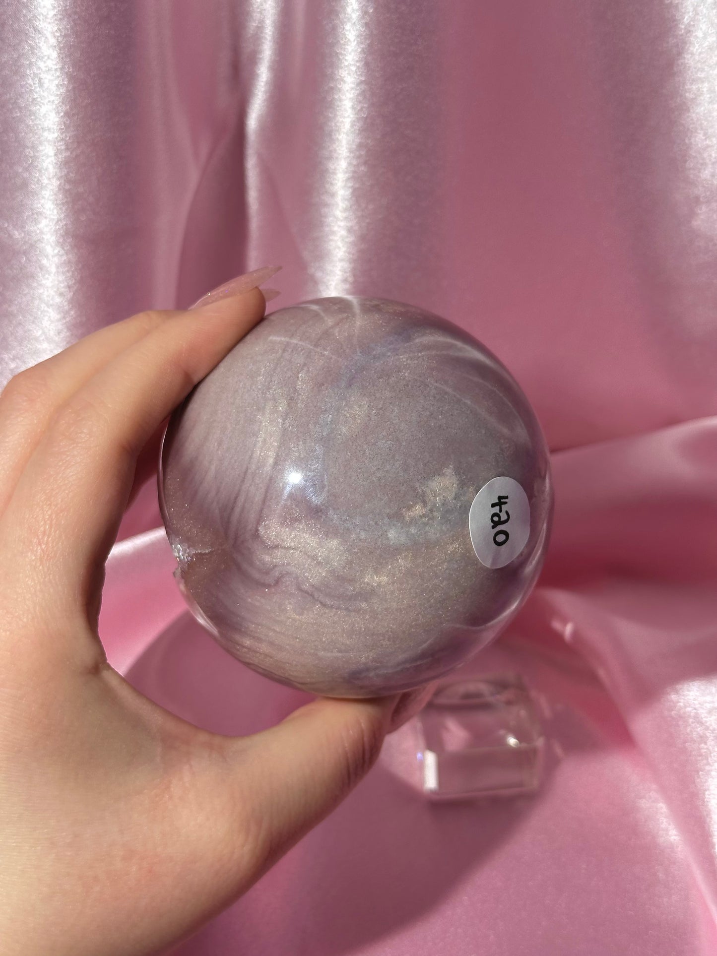Lavender-toned glittery Brazilian pink amethyst sphere with stunning quartz cave