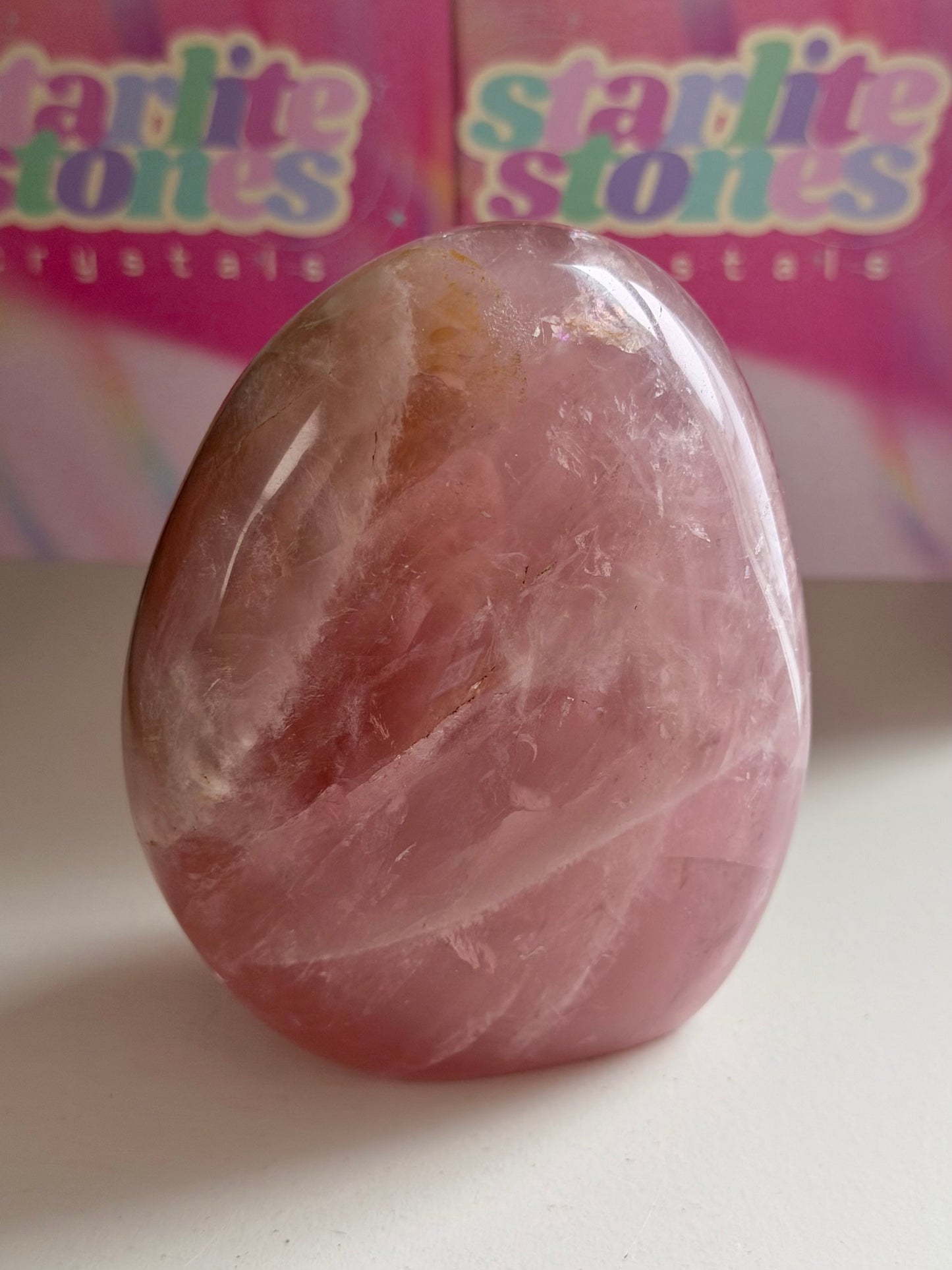 Glassy “guava” pink rose quartz freeform