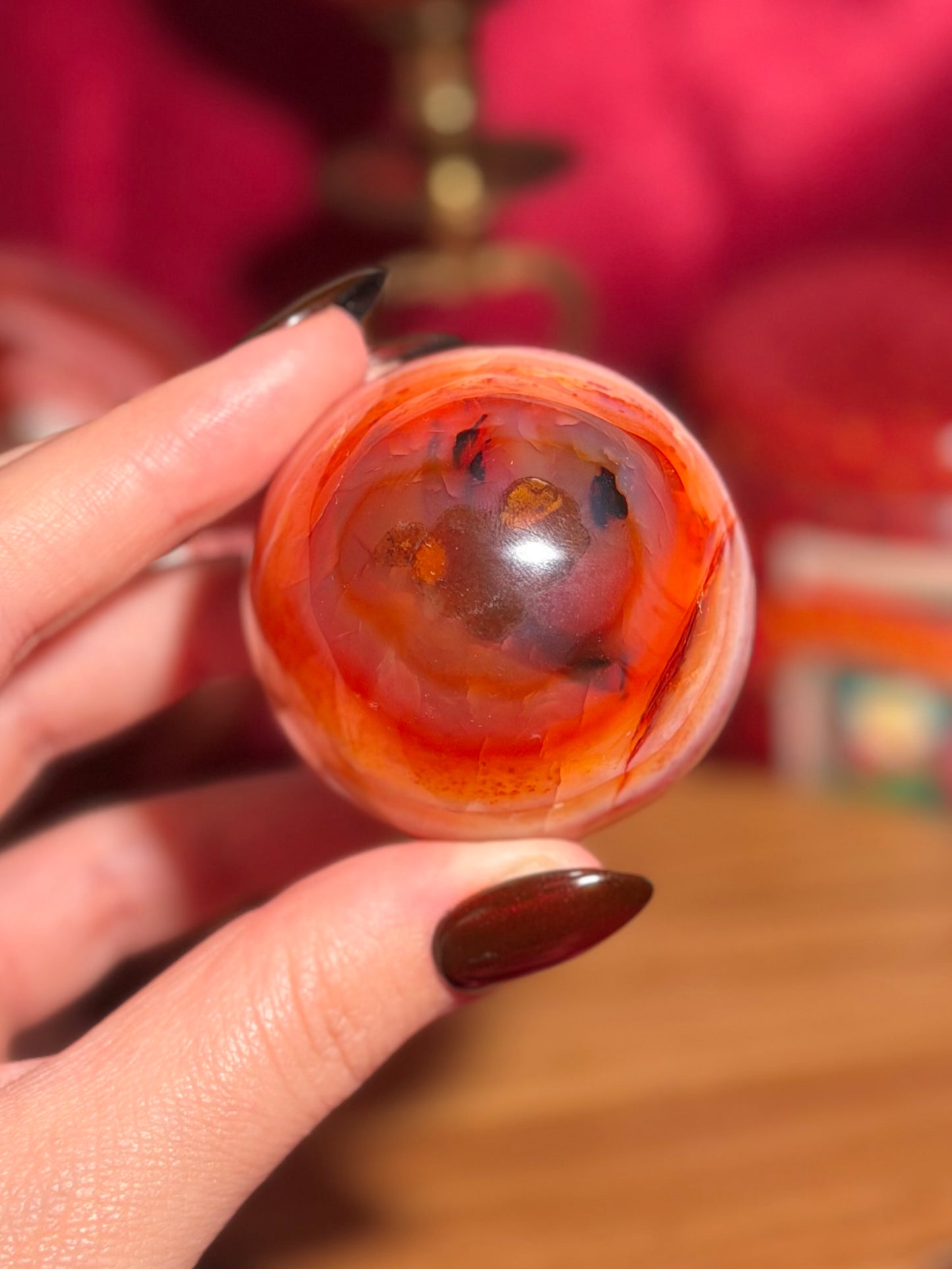 Pink banded carnelian sphere