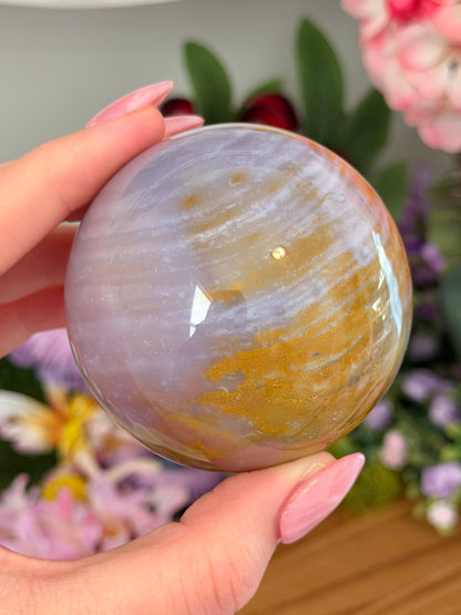 Glowy purple sea jasper sphere