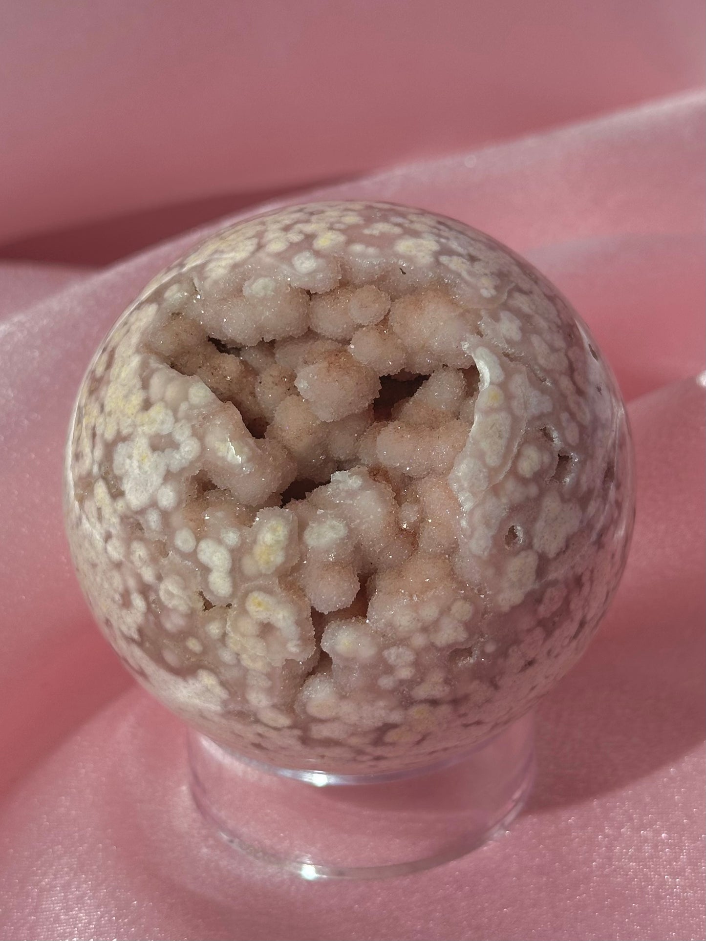 Pink pastel flower agate sphere from Madagascar with bubby druzy