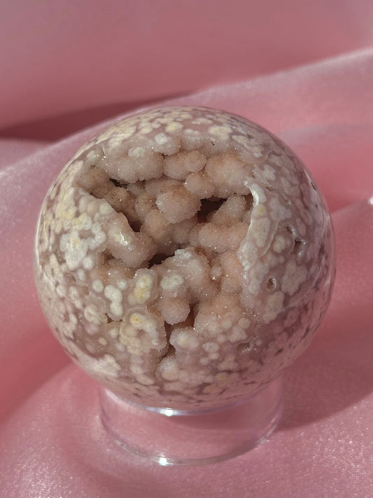 Pink pastel flower agate sphere from Madagascar with bubby druzy