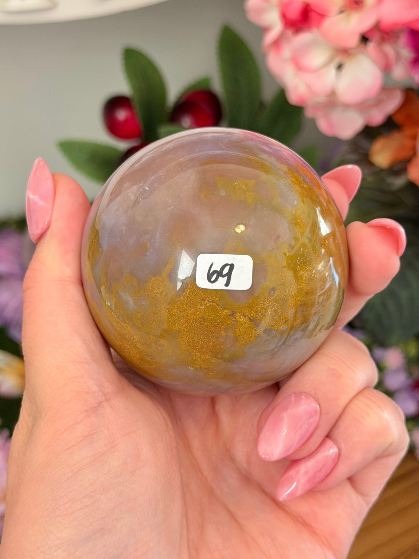 Glowy purple sea jasper sphere
