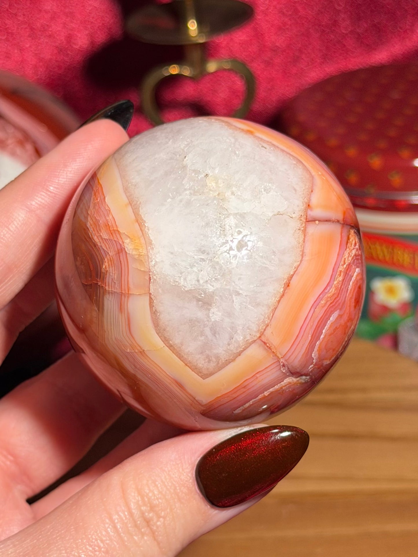 Rainbow carnelian sphere with quartz