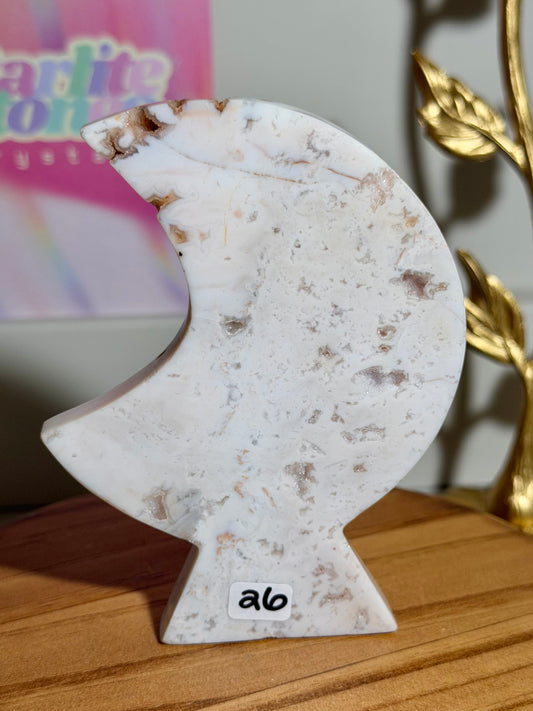 Pink carnelian self-standing moon carving from Indonesia (26A)