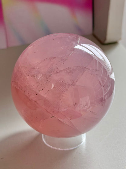 Gemmy purple-pink toned star rose quartz sphere