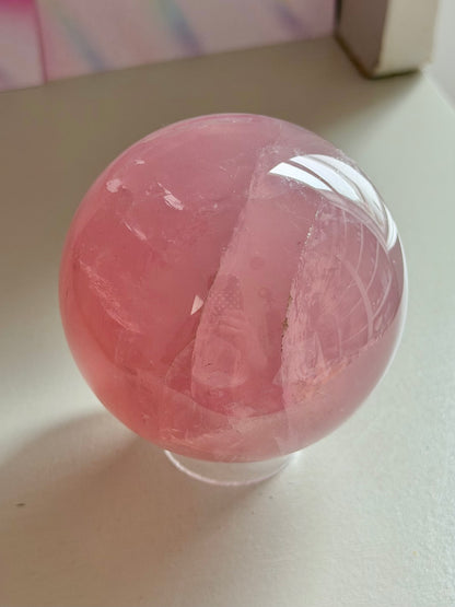 Gemmy purple-pink toned star rose quartz sphere