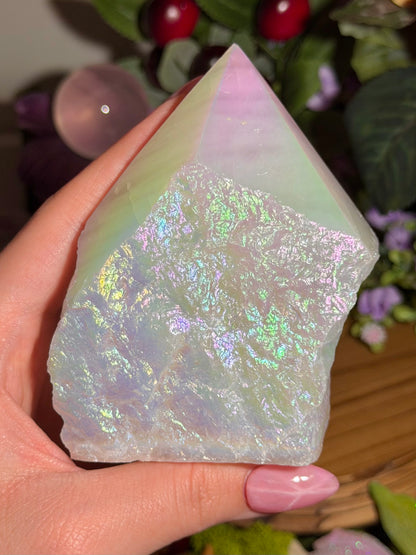 Aura coated rose quartz half polished point from Brazil